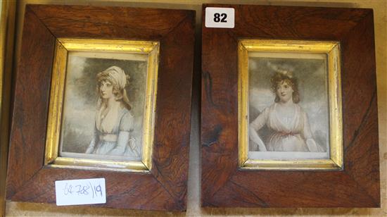 Pair of rosewood framed prints